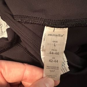 Size large black Marika workout pants. Capris
